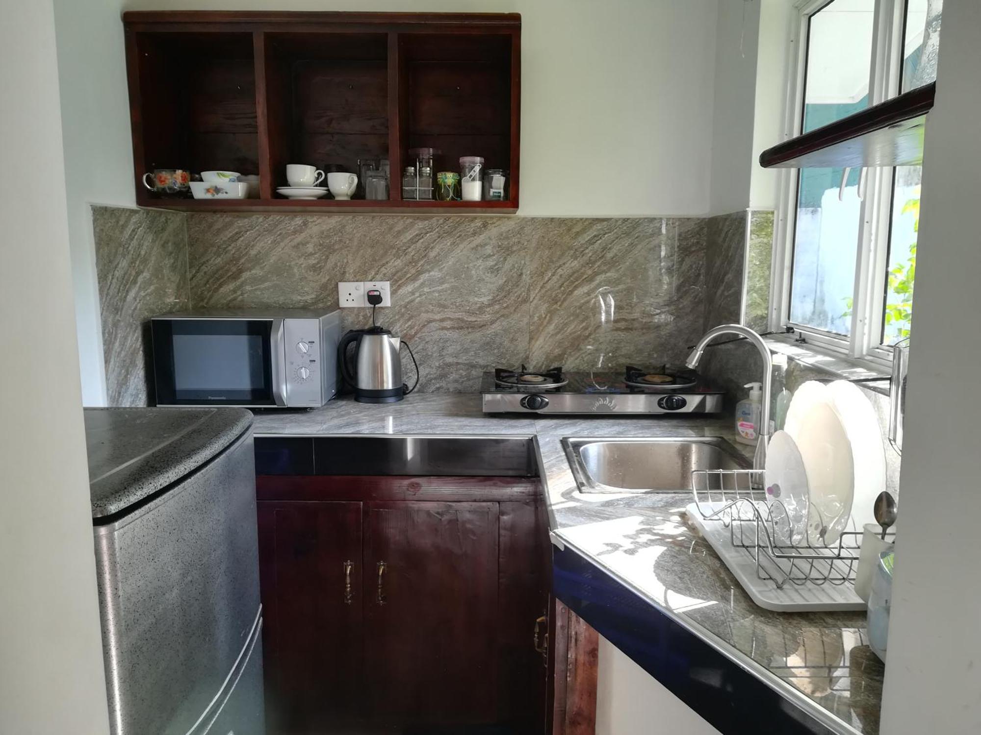 Living Home نيجومبو الغرفة الصورة