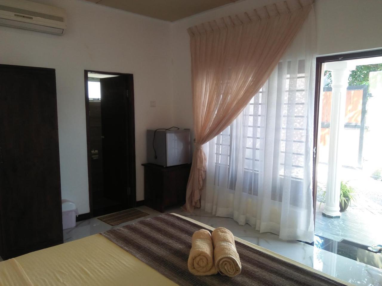 Living Home نيجومبو المظهر الخارجي الصورة